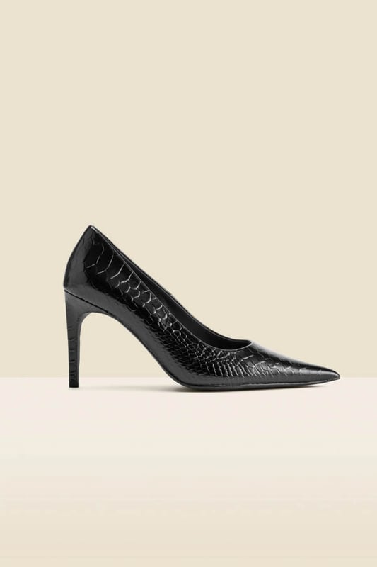 Every wardrobe needs a pairFinished in luxe croc leatherSleek pointed toe silhouette You'll love the statement curved heel Effortlessly chic with 9-5 tailoring Complete your 'jeans and a nice top' combo