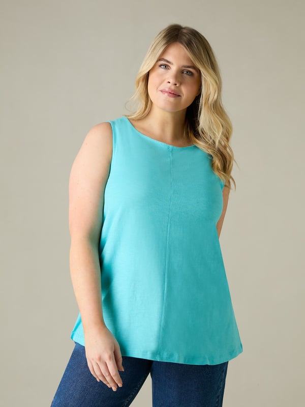 This easy-to-wear vest, cut from breathable cotton, is designed to be the most flattering piece in your wardrobe. In the softest of turquoise slub cottons, with a softly rounded neckline and a centre front seam to give a gentle A-line silhouette to the body, its nice and loose on the tummy, and is the perfect basic staple piece that youll come back to time and time again.