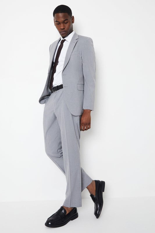 Introducing our Essential Tailored Fit Smart trousers, a must-have addition to your wardrobe. These trousers features a zip fly fastening for convenience and is designed to provide a sleek and polished look. Made with a polyester viscose blend with added stretch ensures a cool and comfortable fit all day long. Pair these versatile trousers with matching items, perfect for any smart occasion.