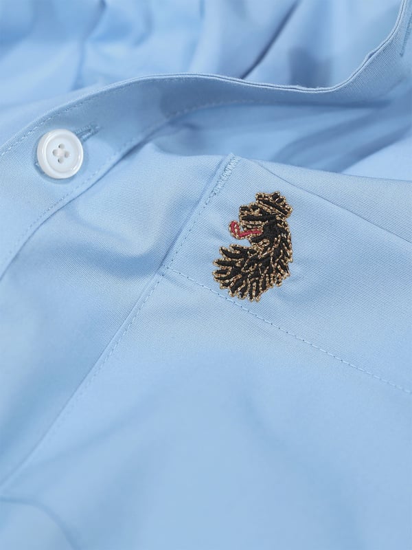 This classic LUKE long sleeved shirt is an essential item for your wardrobe, classically styled with a buttoned-down collar and a simple chest patch pocket. It is detailed with imitation river shell plastic buttons on the central front placket, running from hem to collar and is completed with the brand's iconic lion head embroidery on the left chest. Tailored fit. Iconic LUKE BLACK, GOLD, RED lion head embroidery. Iconic LUKE tri-colour trim tape. Left chest pocket detail-Imitation river shell plastic buttons. Central front placket. Button down collar detail at front and central at back. Back yoke detail and external back box pleat. Long sleeve with buttoned cuff.