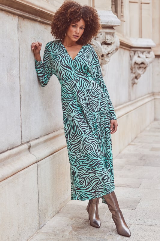 Fuel your animal print obsession
Wrap design to cinch your waist
Pleat detail hem swishes beautifully
Batwing sleeves create a standout silhouette
For brunch or a big night out
Think platforms for dancing, knee-highs for day-to-night chic