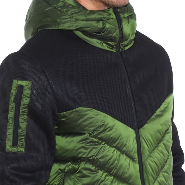 Padded jacket Vuarnet.
 High collar with hood.
 Two-way zipper closure.
 Ribbed cuffs.
 Two pockets with zipper closure on the sides.
 One open pocket and one zipper pocket on the inside.
 One pocket with zipper closure on one sleeve.
 Brand print on the upper side.
 Seams seen in tone.
 Composition: 100% polyester
 Care:
Handwash.
 Do not iron.
 Do not use bleach.
 Do not use dryer.
 Do not dry clean.