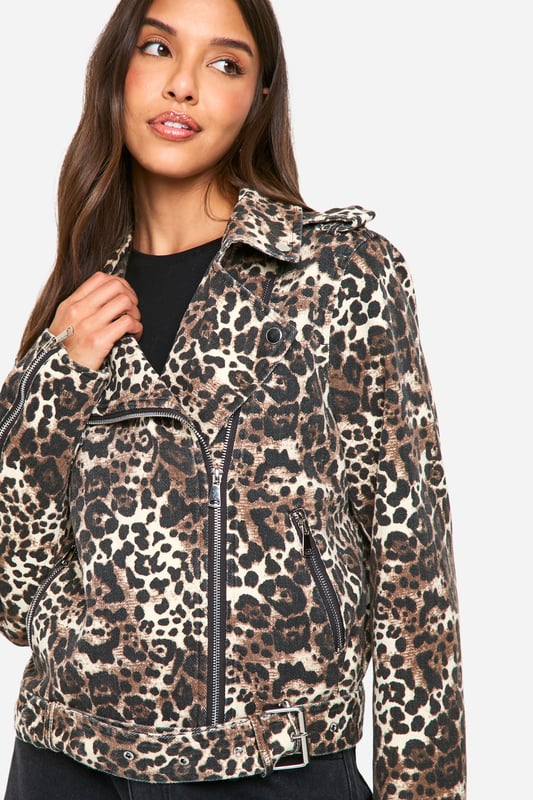 Eye-catching leopard print design
        Classic biker jacket silhouette
        Notched collar with lapels
        Asymmetrical zip front closure
        Multiple functional pockets for practicality
    
    Make a bold statement with this fierce jeans-biker jacket featuring a striking leopard print. The classic biker silhouette is given a wild twist, perfect for the fashion-forward woman who loves to stand out. Style it with a simple black top and wide-leg trousers for a balanced look that lets the jacket take centre stage. Ideal for casual outings or adding edge to your evening ensemble, this versatile piece can be dressed up or down. Pair with ankle boots and statement earrings for a night out, or throw it over a casual dress with trainers for a chic daytime look. The multiple pockets offer both style and functionality, making this jacket a practical choice for various occasions. Whether you're heading to a family gathering or meeting friends for coffee, this jacket will ensure you're always dressed to impress.