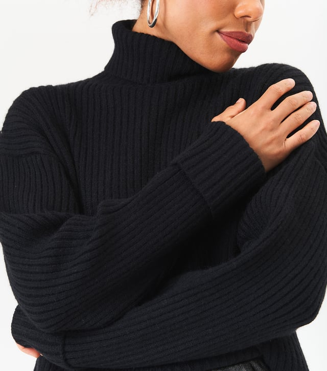Stay cozy and stylish this season with our High Neck Chunky Knit Crop Jumper. Made with high quality materials, this jumper will keep you warm and on trend. The high neck adds a touch of fashion while the chunky knit provides both comfort and durability. Perfect for layering or wearing on its own, this jumper will be a staple in your wardrobe.MeasurementApprox. length- 60 cm