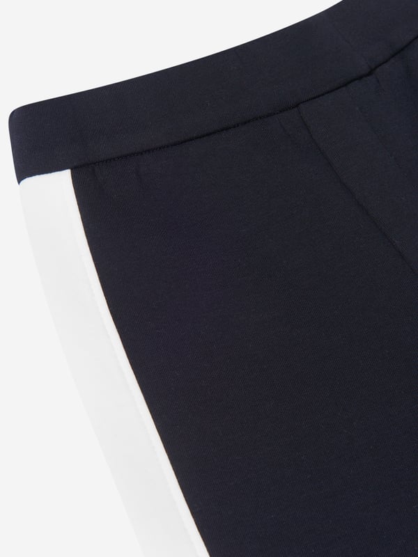 Introducing the Emporio Armani Boys Cotton Double Jersey Shorts‚Äîa luxurious essential for Baby Boy's wardrobe. Here are the remarkable features: Elegant Design: Features a rich blue hue, exuding a refined charm that's signature of Emporio Armani. Superior Comfort: Crafted from premium double jersey cotton, ensuring your little one's utmost comfort during his playful escapades. Chic Appeal: This pair of shorts embodies a trendy design that adds a splash of style and sophistication to your baby boy's look.Upgrade your baby boy's wardrobe with these exclusive shorts from Emporio Armani. Place your order now and make your baby boy the epitome of effortless style and comfort!