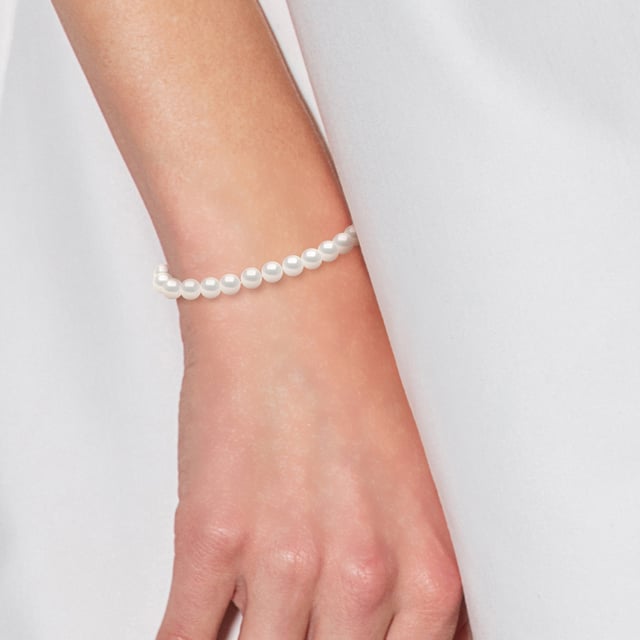 True Armband Gekweekte Parels Zoetwater 5-6mm Ronde - Kwaliteit AAAA + - Colori NATURAL WHITE - Lengte 18 cm - Sluiting Ring MARIN LUXE Yellow Gold 375 duizendste - 2 jaar garantie op fabricagefouten - Wordt geleverd in een zaak met een certificaat van echtheid en een internationale garantie - Al onze juwelen zijn gemaakt in Frankrijk.