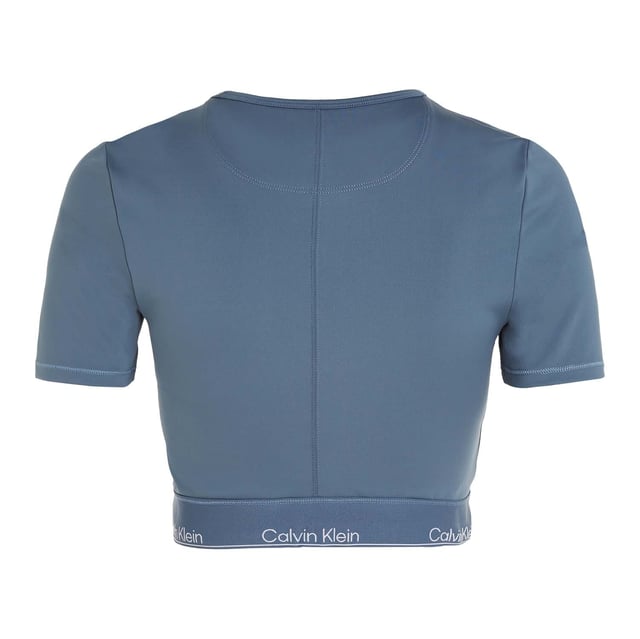 Designed with our most iconic elastic, this second-skin gym top is enhanced with turbo-dry technology and sleek, wicking fabric, to provide lasting dry comfort during any workout.- Double-knit technical stretch blend.- Wicking, quick-dry material.- Slim fit, cropped.- Crew neckline.- Short sleeves.- Forever stretch fabrication for freedom of movement.- Calvin Klein iconic elastic hem. Material: 88% Polyester, 12% Elastane. Ref: 00GWS4K1945BX.