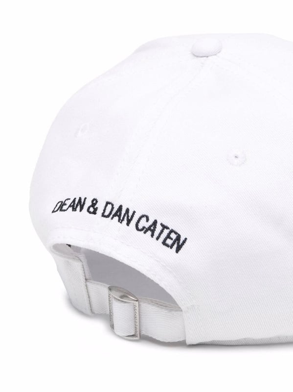 bright white 
cotton 
curved peak
graphic print to the front
rear buckle fastening