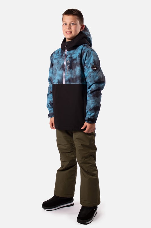 The Breaker snow overhead jacket stands out from the crowd and is our premium youth overhead jacket styled for maximum impact. The Breaker has fully taped seams and is highly waterproof to 10,000mm with a breathability rating of 10,000gms/M2 this technical snow jacket will make sure you’ll stay warm and dry. The Breaker jacket is made from our durable coated ripstop fabric and is feature packed. This jacket offers a great bang for your buck with under arm ventilation for when you need to dump heat, a powder skirt with Lycra wrist guards to keep the snow out and warmth in. A dry butt patch, to do exactly that, lift pass pocket on the left sleeve, soft chin guard, internal storm flap, zipped handwarmer pockets and a zipped comms pocket with headphone routing system all complete this street wear inspired piece.

Powder skirt - Whether you’re hitting the powder on skis or snowboard, this snow skirt creates a tight seal around your waist to keep the snow out and the warmth in. Made from durable waterproof materials and an internal dry butt patch (DBP) to keep it all warm and dry.

Snow cuff / wrist gaiter - This is perfect for even the most extreme conditions, featuring a tight seal that bridges the gap between your glove and jacket.

Zipped pockets - Pockets designed for everything you need for a full day up the mountain. Pockets for your lift pass, media, stash pocket for cash, wallet pocket and phone pocket for protection and to keep the battery warm.

Design features:

    Taped seams
    Fixed hood
    Super soft chin guard
    Zipped sleeve ski pass pocket
    Snow cuffs
    Twin zipped tricot lined hand warmer pockets
    Waterproof snow skirt
    Dry butt patch ( DBP )

Fabric & performance:

    Regular fit
    Shell 100% polyester
    Water resistant coating 10,000mm
    Breathbility rating MVP 10,000 gm²

Insulation & lining:

    100% recycled polyester low loft insulation.
    Insulation. 80 gm² body 40 gm² Sleeves
    Lining 100% recycled embossed polyester.