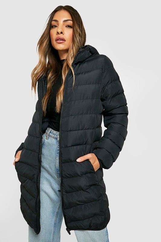 Feeling the chill? Featuring a padded design which is perfect for the colder months, a puffer jacket is the winter staple you need in your life. Warm yet lightweight, a padded jacket has a signature quilted design that's perfect for keeping cosy and insulated all winter. Pair with your fave split-hem jeans and box-fresh trainers and your go-to street style is sorted. If it's extra cold, layer over your fave loungewear set for all the cosy vibes.Style: Puffer JacketFabric: PolyesterLength: LonglineNeckline: HoodedSleeve Length: Long Sleeve