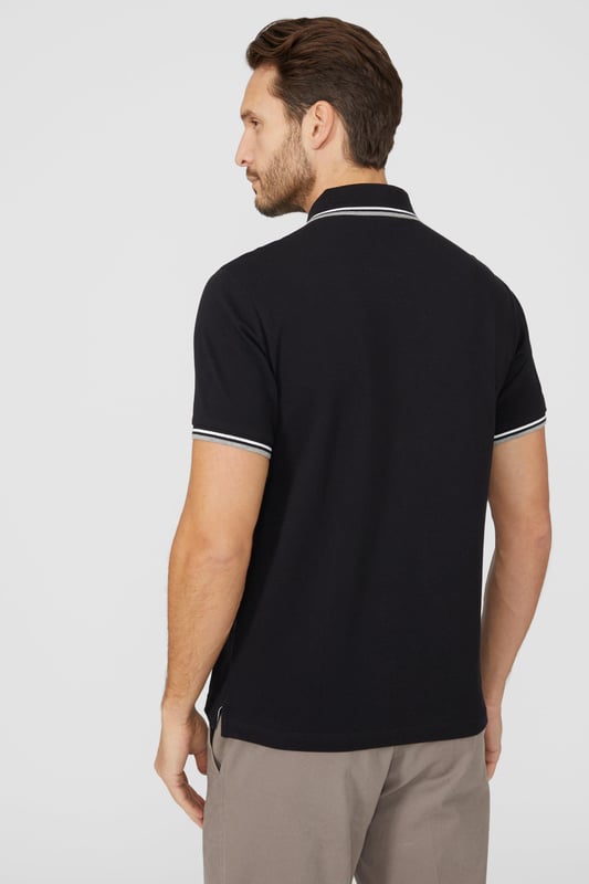 Introducing our Pique Tipped Polo, the perfect addition to any man's smart casual wardrobe. Crafted with meticulous attention to detail, this polo offers a sophisticated and polished look. The pique fabric provides a comfortable and breathable feel, making it ideal for all-day wear. With its stylish tipped collar and cuffs, this polo adds a touch of elegance to any outfit. Whether you're heading to the office or out for a casual gathering, our Pique Tipped Polo is the ultimate choice for a smart and effortlessly stylish look.