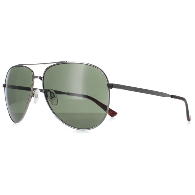 Calvin Klein Aviator Mens Light Ruthenium Green CK22124S  Sunglasses are a harmonious blend of contemporary design and timeless sophistication. Crafted with precision and elegance, these sunglasses feature a sleek and minimalist frame that embodies understated luxury. They boast a lightweight construction for all-day comfort, while its lenses offer superior sun protection and reduce glare, ensuring optimal clarity and vision.