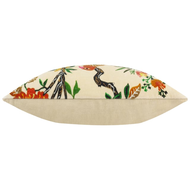 Transform your living space with the Sittacula Embroidered Cushion, where artistry meets sophistication. Featuring a rich velvety base and intricate embroidered detailing, this cushion brings to life a majestic bird nestled among lush foliage, evoking the serenity of tropical escapism. The printed face design, with its vivid textures and delicate stitching, merges harmoniously with a minimalist reverse side, offering versatility for your decor. Whether placed on a sofa or an accent chair, this cushion adds a refined yet relaxed touch, perfect for anyone who treasures nature-inspired details and the timeless allure of pattern and print.