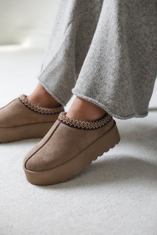 Stay stylish and comfortable all day with our Freeze Flatform Embroidered Low Ankle Slipper Boots. These boots are a perfect addition to your footwear collection, featuring a chic design that you can dress up or down.
Key Features:


Effortless Style: The sleek and minimalist design of these boots ensures that they complement almost any outfit you wear. They are perfect for dressing up or down and exude casual elegance that adds an extra flair to your style.

All-Day Comfort: Our boots are built with your comfort in mind. They feature a soft and comfortable interior lining that provides maximum comfort, ensuring you can wear them for long periods with ease.

Durable Construction: Our Low Ankle Slipper Boots are made with high-quality materials that ensure long-lasting durability. They feature a sturdy construction and reliable stitching that makes them practical and sustainable for everyday use.

Specifications:

Material: Faux Suede
Closure: Slip On
Heel height: 1 inch
Toe shape: Round

Invest in our Freeze Flatform Embroidered Low Ankle Slipper Boots for a perfect combination of style and comfort. Enjoy the joy of comfort with every step you take. Get yours today and step out with confidence and style!