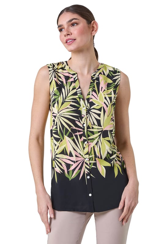 Sleeveless Leaf Print Blouse from Roman. Have fun with tropicals this season with our vibrant leaf print blouse. Cut from a smooth woven fabric, this top features a feminine notch neckline and is designed in a Summer-ready sleeveless style. Adorned in a bold palm leaf print, this piece has sweet button detail at the front for the perfect finishing touch. Pair with cropped trousers and sandals for a day of sightseeing in the city then simply add a lightweight denim jacket for dinner!