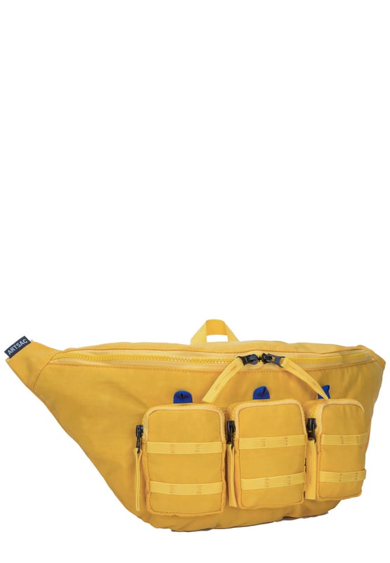 The perfect practial edition to any outfit. This unique triple-pocket design sling bag has enough internal and external space to carry all your every day essentials. Constructed from our unique Contore crushed Nylon fabric. Features: , Water Resistant Contore nylon fabric, 2 Mobile phone internal net pockets, Adjustable shoulder strap allowing backpack styling or bum bag styling, Zip top opening to main compartment, Triple front zip pocket with webbing loops Single zip pocket for smaller valuables, Internal zip pocket, External rear zip pocket, Top grab handle Style Ref: 52003 YELLOW