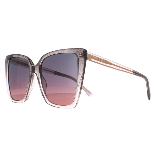 Jimmy Choo Cat Eye Womens Nude Glitter Grey Fuchsia LESSIE/S  Sunglasses are a stylish cat eye frame, enhancing your facial features while providing optimal sun protection. The high-quality acetate material used in their construction ensure durability and comfort, making them the ideal companion for both everyday wear and special occasions. The Jimmy Choo logo features on the temples for brand authenticity.