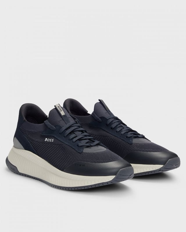 Expertly crafted with a ridged outsole for a sportive profile, these trainers are designed in a combination of materials including smooth leather. Signature detailing appears throughout for a distinctive touch.

Laces
Partially lined
Packaging: Box

85% Polyester (recycled) , 15% Polyester, 100% Polyester, 85% Polyester, 15% Polyurethane, Sole: 70% Ethylene vinyl acetate, 30% Rubber, Facing: 100% Thermoplastic polyurethane, 100% Cow skin, Upper material: 85% Polyester (recycled), 15% Polyester, Innersole: 100% Polyester
 
50523113
 