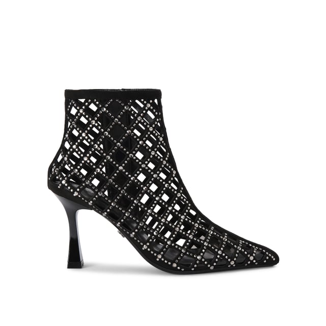 This Carvela Ankle Boot features a black microsuede upper with cut out details and silver crystals across the upper. The toe is pointed with an interior smoked lining and the heel is flared in design. Heel height: 8.5cm.
