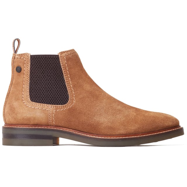 Base London Portland Leather Men's Ginger Boots The Portland Chelsea Boot by Base London is crafted with premium leather uppers, a robust nylon pull tab, and elasticated gusset for easy wear. The cushioned Ortholite insole ensures comfort, while the thick rubber studded sole adds a rugged touch.