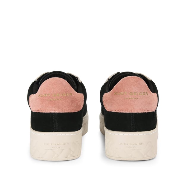 The Kensington Cupsole sneaker features a black suede leather upper with grey and pink panels. The front laces up with antiqued eagle head at the base of the laces. The sole is quilted in rubber.