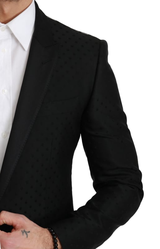 Color: Black polka dotted pattern
  Model: Single breasted one piece formal jacket blazer coat
  Material: 50% Virgin Wool 50% Rayon
  Inner Lining: 100% Silk
  Fit: Slim Fit
  One front button closure
  Three front pockets
  Three inside pockets
  Logo details
  Made in Italy
Material: 50% Virgin Wool 50% Rayon