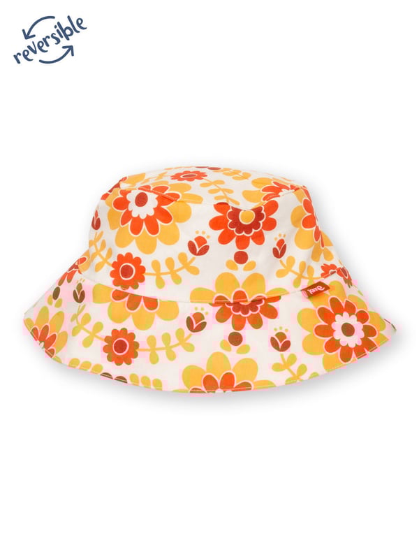 100% organic cotton |  Proud to be certified by Control Union to the Global Organic Textile Standard (GOTS) |  Groovy floral all-over print on one side |  Groovy dot all-over print on reverse |  Warm yellow |  Poplin and double layer muslin fabrics |  Fully reversible |  Protective brim |  Made in India |  Machine washable at 40 degrees, or at 30 degrees to be kinder to the planet