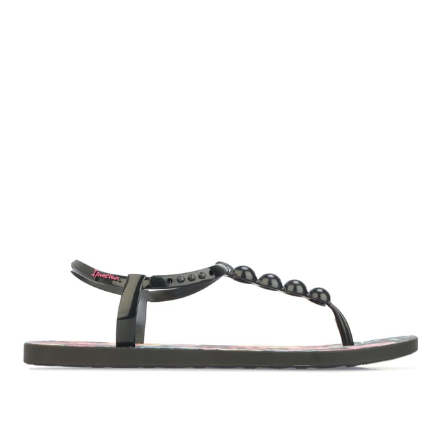 Womens Ipanema Frida Sandals in black.- Rubber upper.- Adjustable ankle strap.- Linked to the toe post with a beaded front strap.- Colourful Frida Kahlo-inspired foliage design printed on the Wave footbed.- Bright pink Ipanema logo.- Rubber sole.- Ref: 27021AI782