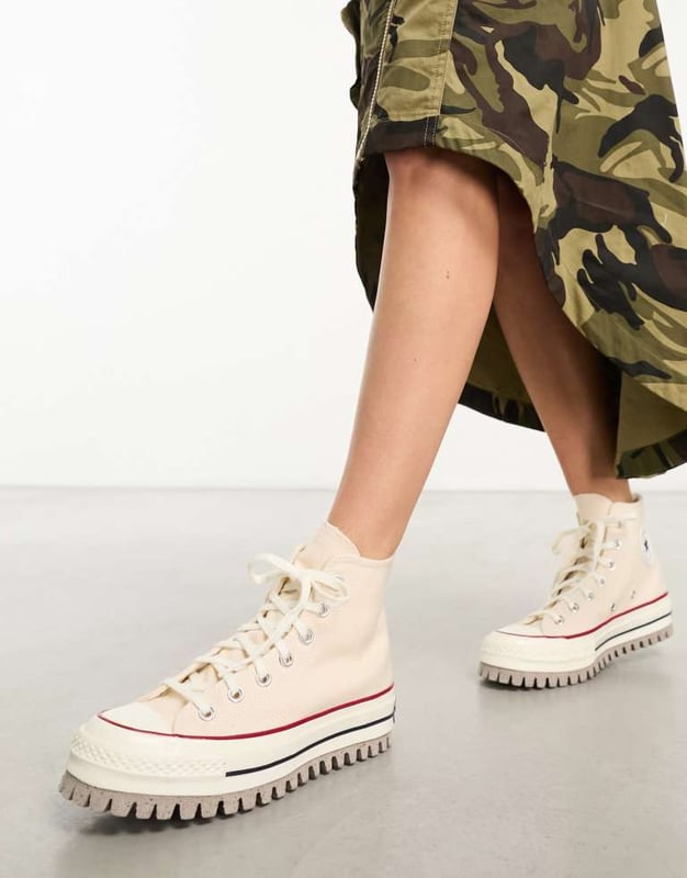 Shoes by Converse New kicks for your 'fit High-top design Lace-up fastening Signature Converse branding CX foam insole and midsole absorb impact and provide lightweight cushioning Chunky sole Lugged treadSold By: Asos
