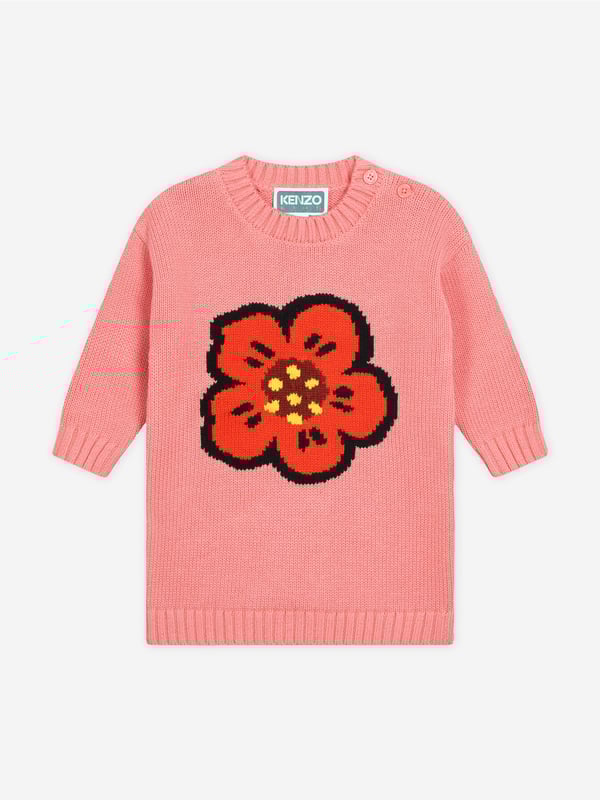 Wrap your little one in luxury with the Baby Girls Boke Flower Knitted Dress in Pink by Kenzo. Perfect for any season, this dress combines elegance and comfort in a chic pink hue.  Eye-catching Boke Flower Design: Features an exquisite floral pattern that captures Kenzo's iconic style. Premium Knitted Fabric: Crafted with soft, high-quality yarns for utmost comfort and durability. Versatile Style: Ideal for casual outings or special occasions, ensuring your girl shines wherever she goes.Elevate her wardrobe with this sophisticated and playful dress. A true designer piece that blends fashion with comfort.