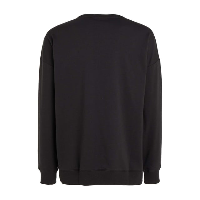 Mens Calvin Klein Lounge Sweatshirt in black.- Ribbed crewneck.- Ribbed cuffs and hem.- Signature tape inside the neckline.- Calvin Klein embroidery on the chest.- Regular fit.- Ref: 000NM2300EUB1