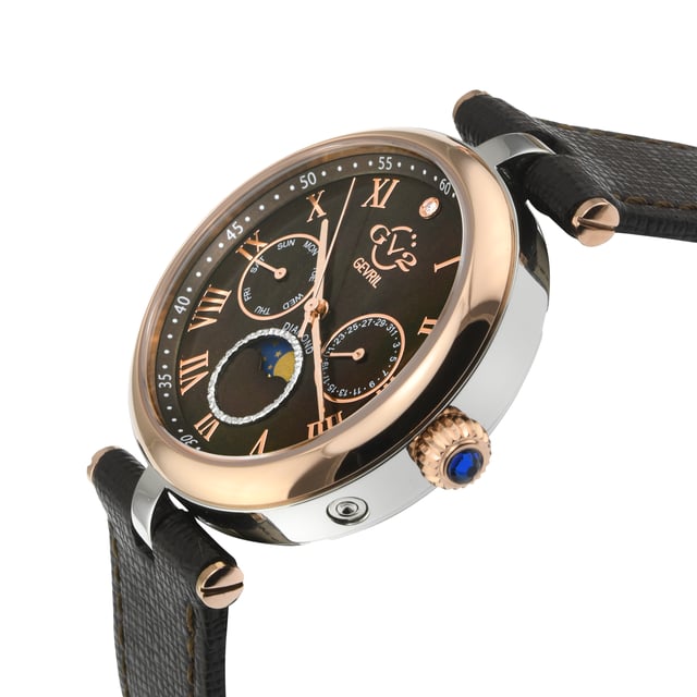 GV2 12511.L Women's Florence Diamond Swiss Quartz Watch

GV2 Women's Swiss Quartz Watch from the Florence Collection
36mm Round IPRG Case with Roman Numerals, Diamond at Twelve O'clock
Burgundy MOP Dial, Day and Date Sub Dials
Push Pull Fluted crown with Blue cabochon Stone
Genuine Italian Brown Leather Strap with Tang Buckle 

Anti-reflective Sapphire Crystal
Water Resistant to 50 Meters/5ATM
Moon Phase Swiss Quartz Movement Ronda 706.1