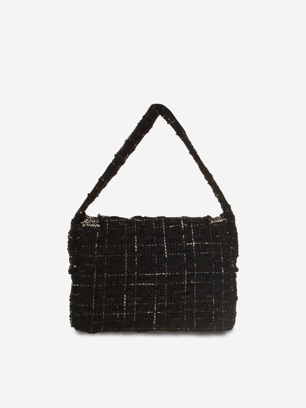 Patachou embody the finest high qualities this holiday season. This girls tweed handbag in black is reflective of the Portuguese label's passion for traditional abstracts. Made in a frayed tweed silhouette, it will be her favourite bag to show off this festive season.‚ Button Fastening‚ Shoulder Strap‚ Antiqued Hardware‚ Fabric: 100%