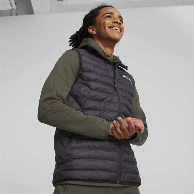 PRODUCT STORY: The PackLITE vest does exactly what it says on the tin: it's an ultra-lightweight design that packs down neatly into its own pocket. When unfurled, it combines the weather-proof power of insulating warmCELL, wind-shielding windCELL, and a water-repellent coating. Perfect for outdoor adventurers who never know when they might be taking on the next challenge. FEATURES & BENEFITS: warmCELL: Breathable cold weather technology designed to trap heat close to your body and keep you warm during exercise; windCELL: Technology designed to protect against the wind and keep you comfortable during exercise; Recycled Content: Made with at least 20% recycled material as a step toward a better future. DETAILS: Slim fit; Signature tape on the back; Stand-up collar; Full-zip closure; Side seam pocket into which the vest can be packed down; Internal chest pocket; PUMA Cat Logo print on the left chest; PUMA Wordmark print on the back; PrimaLoft® insulation.