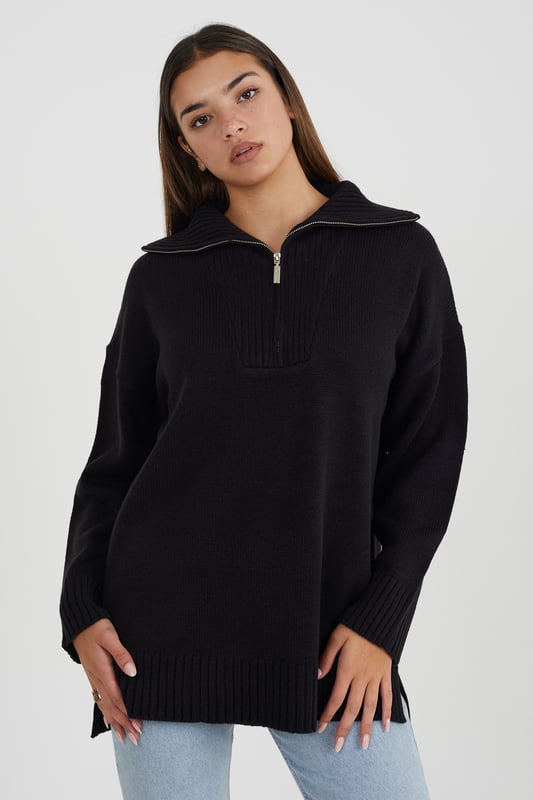 Update your everyday essentials wardrobe with this oversized jumper from Brave Soul. Cut in an oversized fit, featuring zip collar fastening, oversized ribbed collar, cuffs, and hem with side splits. Team with a pair of jeans to elevate your casual look. Model wears UK size S.