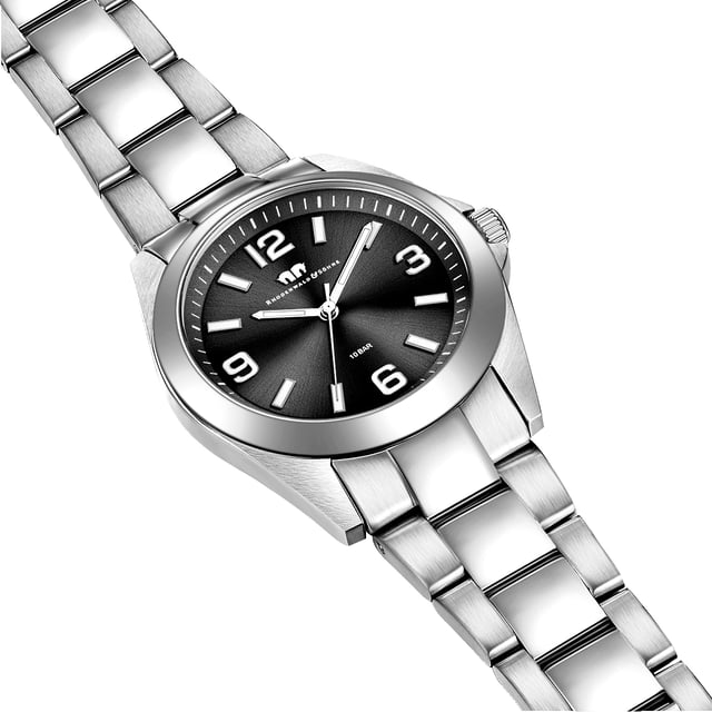 Are you looking for a watch with a timeless design in connection with your own character and excellent quality? Then this timepiece of the Rhodenwald & Sons brand is the perfect choice. The clock manufacturer stands for stylish and sustainable masterpieces for all generations: the women's watch inspires with a tidy dial, minimalist line indices, Arabic numbers, minute and luminiscant staff. The robust stainless steel housing and a suitable link strap made of stainless steel form an exciting contrast to the dark dial and fit harmoniously into the overall concept. A long-lasting quartz clock, a screwed housing floor and waterproof up to 10 ATM complete the exclusive equipment.