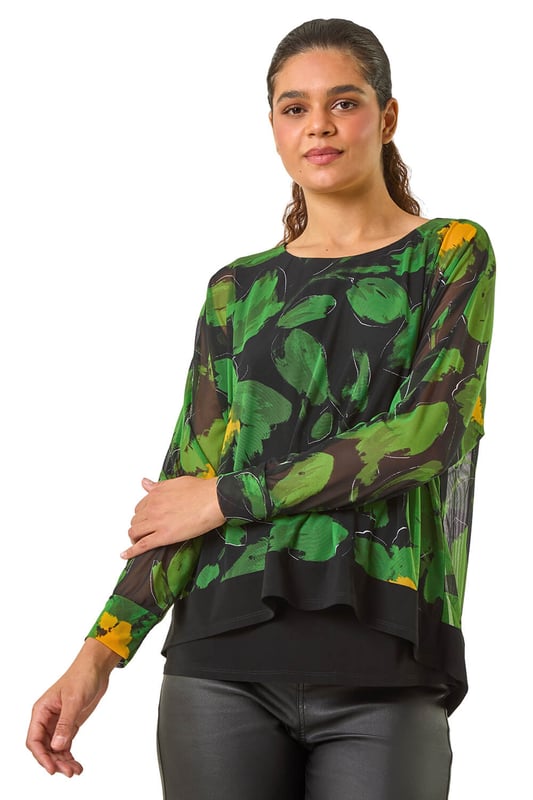 Floral Mesh Overlay Stretch Top from Roman. Make a standout statement this Autumn and Winter with this stunning printed mesh overlay top. Featuring an eye catching all over floral print, this top has a delicate mesh overlay with a soft jersey inner for comfort and style combined. The 3/4 sleeves and classic round neck make this piece a versatile and chic addition to your wardrobe. Pair with tailored trousers and heeled boots for a sophisticated look that's perfect for any occasion!