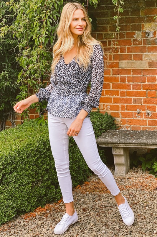 REASONS TO BUY: It'll transform your jeans and trousersYour new animal print fixFaux wrap front won't fall openOn-trend shirred waist: it's super-flatteringSexy sheer sleevesJust add white skinnies.