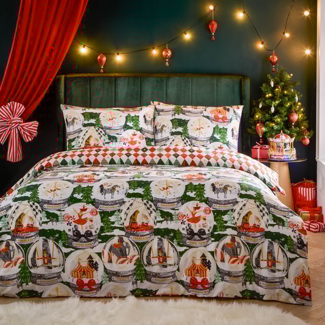 Welcome to the show! Presenting an enchanting collection of scenic snow globes inspired by the circus and festive fairgrounds. This fabulous extravaganza features festive characters and wandering exotic animals, because what’s life without whimsy? Perfect for themed Christmas bedrooms, the Showtime duvet cover set is complete with a harlequin diamond reverse for an alternative look.