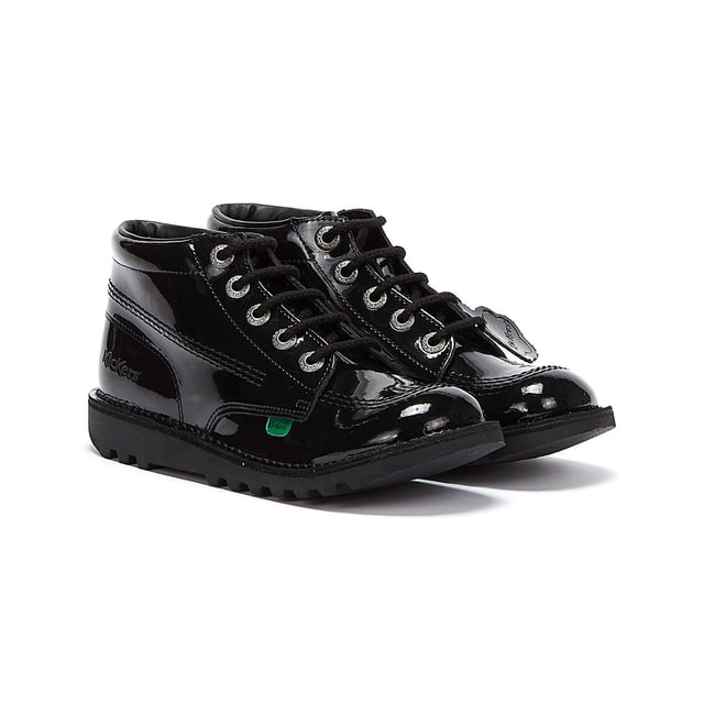 The Kickers Kick Hi Kids Shoe has been on trend since 1975.  With its trademark rubber sole, brass eyelets, and triple stitching for a great classic look.  Now With a Patent leather shiny upper and Trademark Red and Green Tab on side.  Added Kickets Fleurette with a high collar and durable sole for added support.