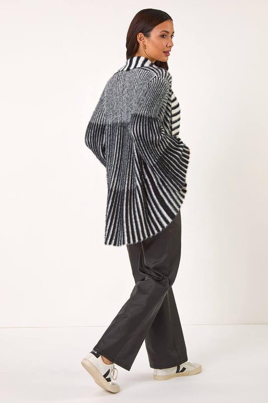 Shawl Fluffy Striped Knit Cardigan from Roman. Wrap up in style this Autumn/Winter with this shawl fluffy striped cardigan. The perfect layering piece, this cosy cardigan features stylish stripes and long sleeves, ideal for keeping you warm during the colder months. Whether you're running errands or meeting friends for coffee, pair it with a simple t-shirt and jeans for a laid back yet chic look.