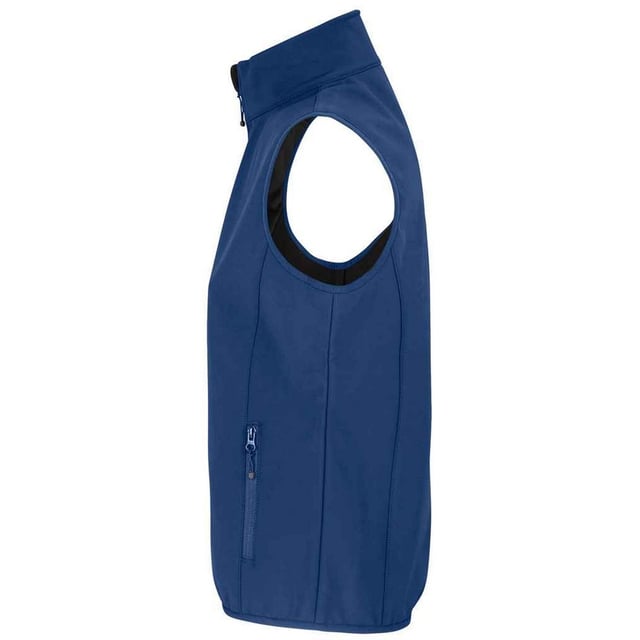 Outer Materials: 94% Recycled Polyester, 6% Elastane. Lining: Fleece, Polyester. Fabric: Softshell. Design: Plain. Fabric Technology: Breathable, Waterproof, Windproof. Bound Armholes, Chin Guard, Elasticated Arm Holes, Inner Zip Guard, Tearaway Label, Three Layers. Sleeve-Type: Sleeveless. Neckline: Standing Collar. Pockets: 1 Chest Pocket, 2 Lower Pockets, Zip. Fastening: Full Zip. Hem: Bound, Elasticated. Sustainability: Amfori, BSCI, Fair Wear Approved, GRS Certified, Oeko-Tex Standard 100 Certified, PETA-Approved Vegan, REACH.