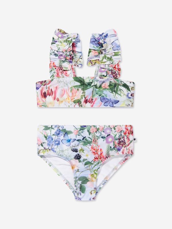 Introducing the Girls Floral Print Bikini In Multicolour, a statement piece for your Girl's summer wardrobe by Molo. Key features include: Chic Design: A vibrant floral print makes this bikini set a real eye-catcher, perfect for summertime swims and beach picnics. Premium Quality: Crafted from soft and durable materials, providing optimum comfort for your little one's aquatic adventures. Aesthetic Appeal: A Stylishly designed multicoloured bikini set that significantly elevates your girl's summer look!Add a pop of colour to your Girl's collection with the Floral Print Bikini by Molo in Multicolour. Don't miss out, order now!