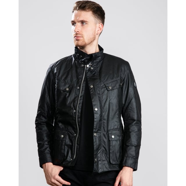 A mainstay of the World Tour collection, the Duke is a re-work of the iconic Enfield jacket in a winter-ready waxed cotton.
With biker styling and a robust construction, the Duke is crafted in Barbour&rsquo;s 6oz Thornproof wax for durable protection with a lustrous finish, complete with a two-way zip and hardy studded storm fly front. A quilted nylon lining adds warmth, while the cosy funnel collar and stud-fastening cuffs boast a contrast corduroy lining for incredible softness and a signature Barbour look.
Paying homage to Barbour&rsquo;s motorcycle heritage, authentic detailing includes elbow patches, four studded pockets and a collar strap. The lower bellow pockets feature a stylish pleat and are generously proportioned to carry essentials without adding bulk, while a zipped inner pocket safeguards valuables. Available in four versatile colours with the Barbour International badge to the sleeve, the Duke is subtly tailored with a relaxed fit ideal for winter layering.

Back length: 28.5–32" | 71.5–81.5cm
Mediumweight 6oz Thornproof wax outer
Sponge clean only