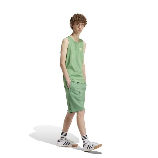 Mens adidas Originals Trefoil Essentials Shorts in preloved green.Going beyond basic  these adidas shorts are built for everyday comfort. The cotton-fleece blend is easy to wear  and zippered pockets stash the essentials so you can keep living life on the go. The versatile design is ready to pair with anything from a tee to a sweatshirt. However you wear them  these shorts will become the pair you reach for time and again.- Simple shorts destined to become a favourite top-drawer choice.- Regular fit- Drawcord on elastic waist- 70% cotton  30% polyester (recycled)- Side zip pockets- Ref: IU2355