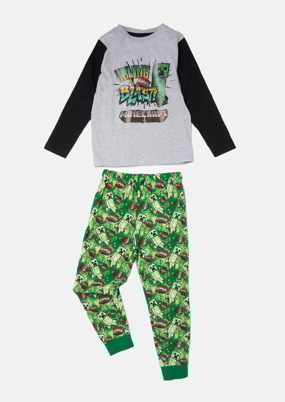 These supersoft Minecraft branded PJs with our A&R twist are a collab dream and perfect for 'having a blast' at sleepovers! About me: Top: 93% Cotton/7% Polyester. Bottoms: 100% Cotton Angel & rocket cares - made with fairtrade cotton Look after me: think planet. machine wash at 30c.
