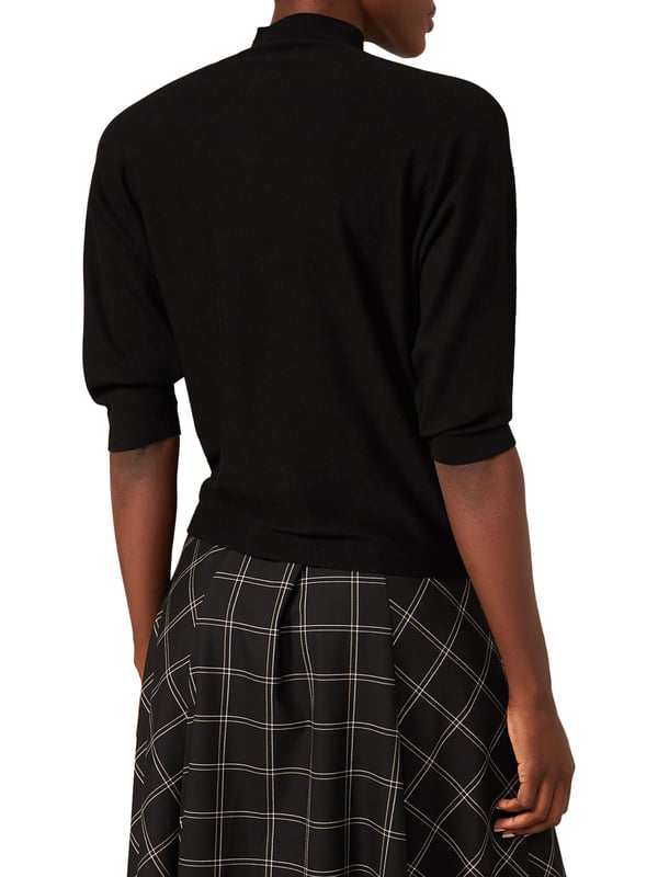 Combine comfort and style with our Cristine Turtle Neck Jumper. Crafted from a soft knitted fabric this style comes in a fitted silhouette with 3/4 length sleeves and warm turtle neck. We're wearing ours with jeans for days off or with a pencil skirt for work.