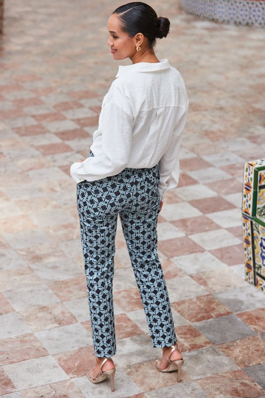 Outfit-transforming trousersCut in a timeless tapered silhouetteSplashed with a standout geo print - prepare for complimentsYou'll wear them for work and playEffortlessly chic with a white shirtComplete the look with courts and a blazerInside leg to fit: Short 29" | Regular 31" | Long 33"
