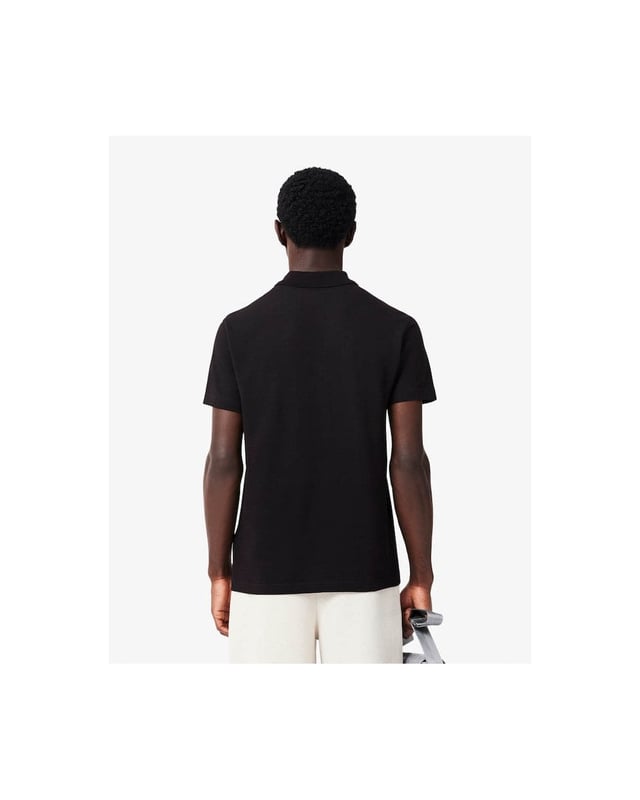 A new take on elegant sportswear with full freedom of movement from Lacoste, inventors of the polo shirt in 1933. This cotton blend knit piece features a fine rib that's particularly pleasant to wear. Featuring iconic styling and sophisticated finish details: the stuff of legends.

Organic cotton blend ottoman fabric
Regular, straight cut
Polo collar, inspired by the Original L.12.12
Pad printed detail at neck
Embroidered crocodile on chest
Main fabric: Cotton (57%), Polyester (32%), Elastane (11%) / Collar: Cotton (53%), Polyester (47%)