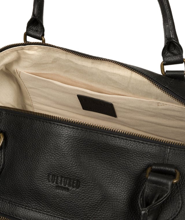The 'Harbour' holdall from Cultured London is handmade from genuine leather that has a rich texture for a distinct finish and the zip-over top conceals the spacious interior, lined with robust and untreated 100% cotton. A zipped pocket adorns the front of the holdall which is ideal for on-the-go storage and comes with matching leather handles alongside the adjustable and detachable webbed strap, with a drop length of 80cm. Finished with the clean and minimalist embossed Cultured London logo.